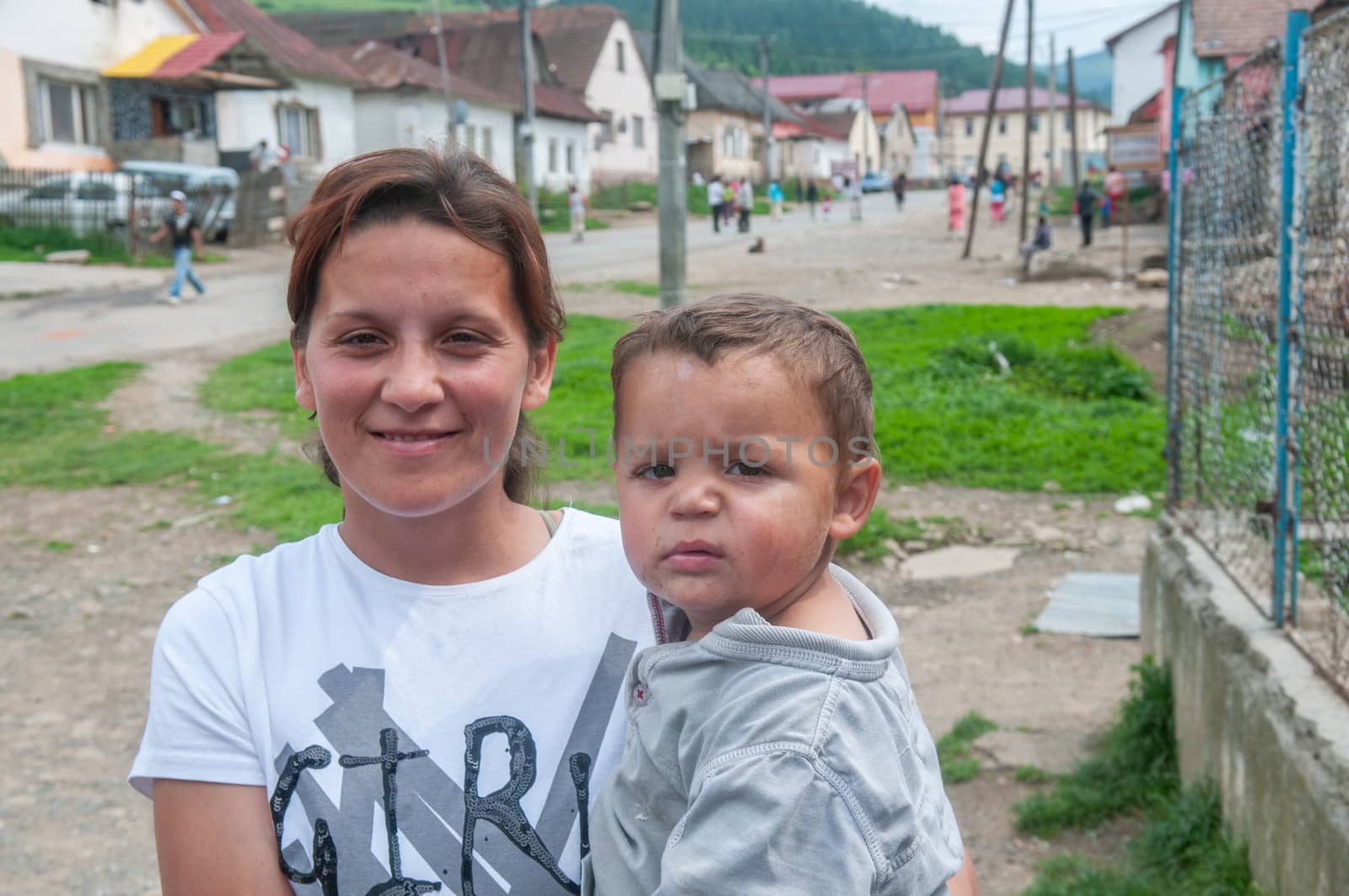 5/16/2018. Lomnicka, Slovakia. Roma community in the heart of Slovakia, living in horrible conditions. Portrait of mother and baby. by gonzalobell