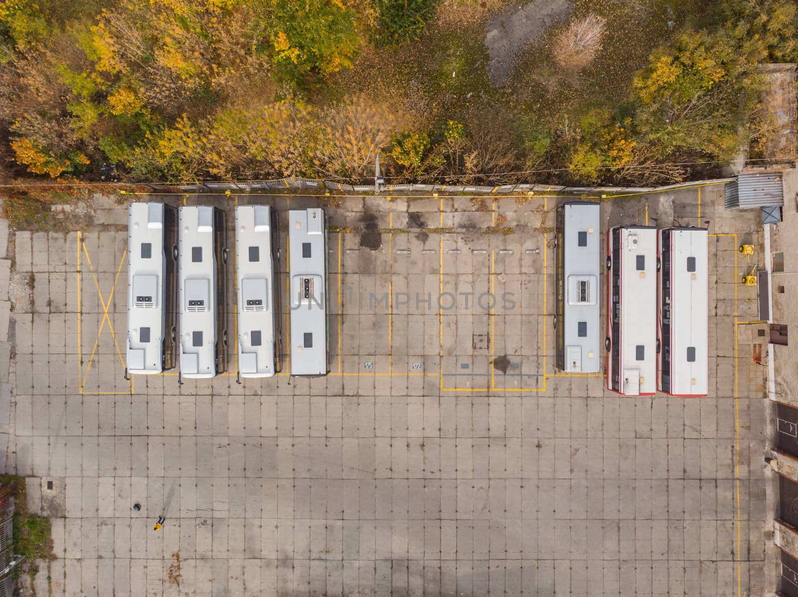 Aerial top down look to parking for buses by Wierzchu