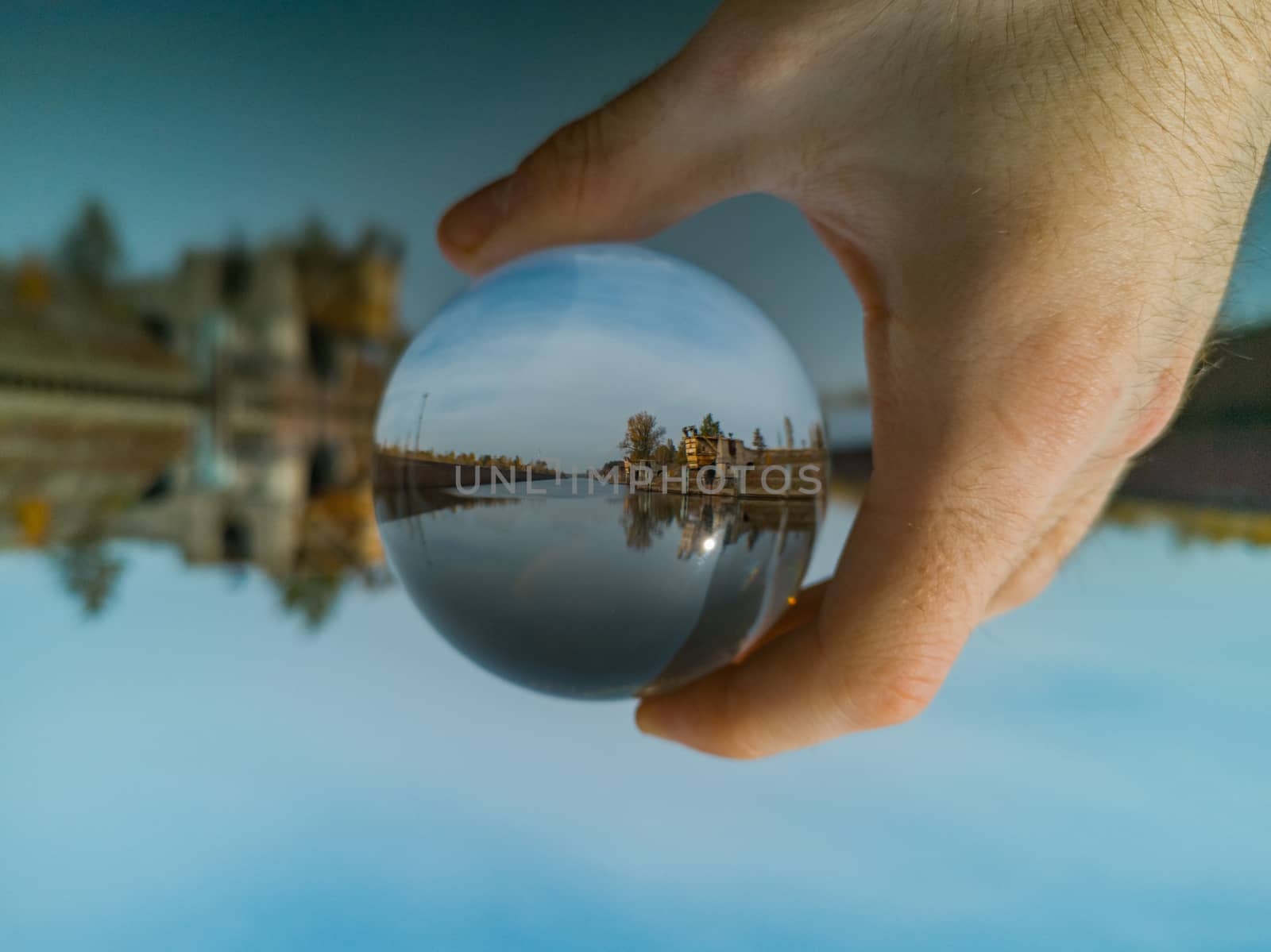 Old city port reflected in crystal glassy lensball by Wierzchu