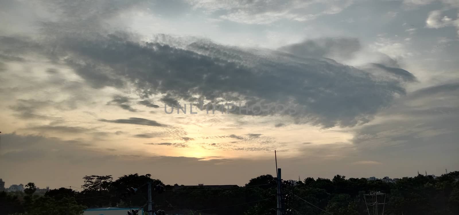 sunset and white cloud on sky by jahidul2358