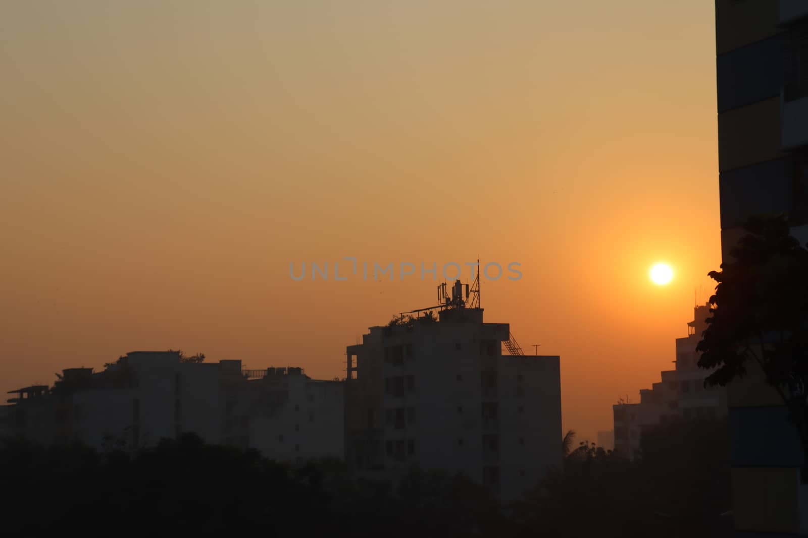 sunset on sky with city view