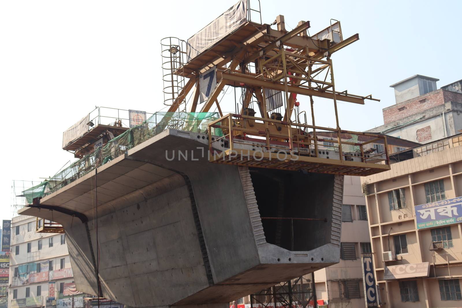 metro rail fly over line view with construction equipment