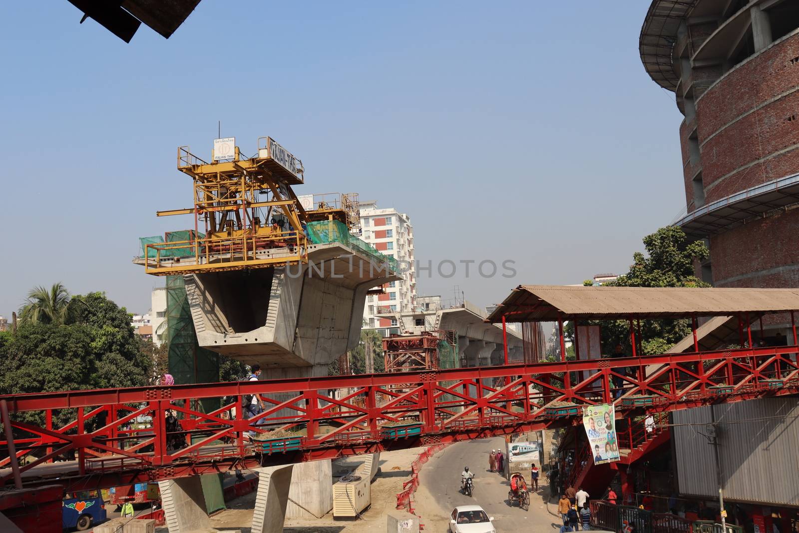 metro rail fly over line view with construction equipment