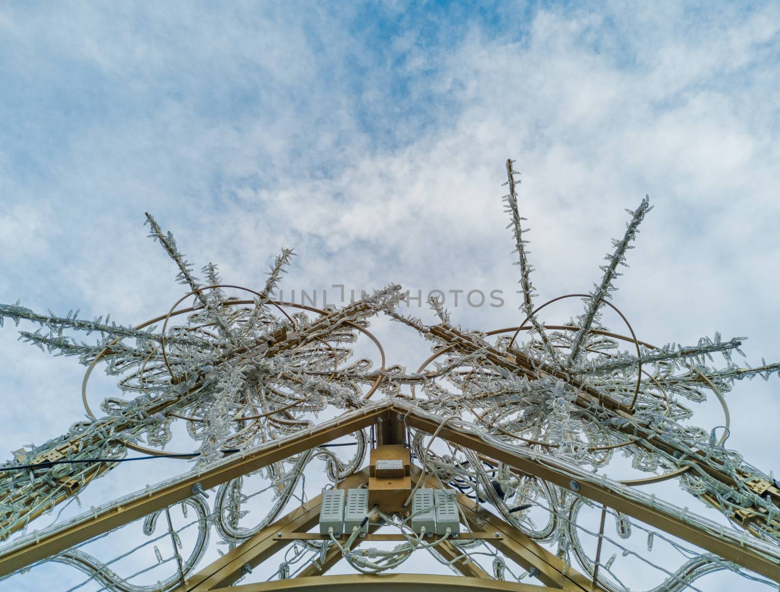 Upward view to christmas decorations at daytime by Wierzchu