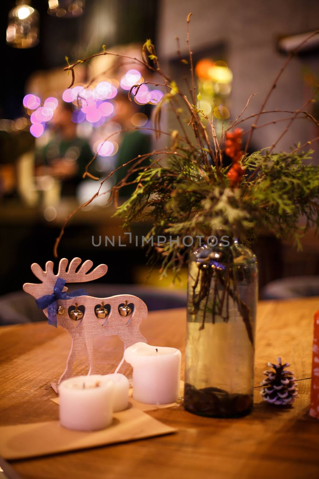 Minimalistic Christmas decor cozy warm room with wooden furniture.