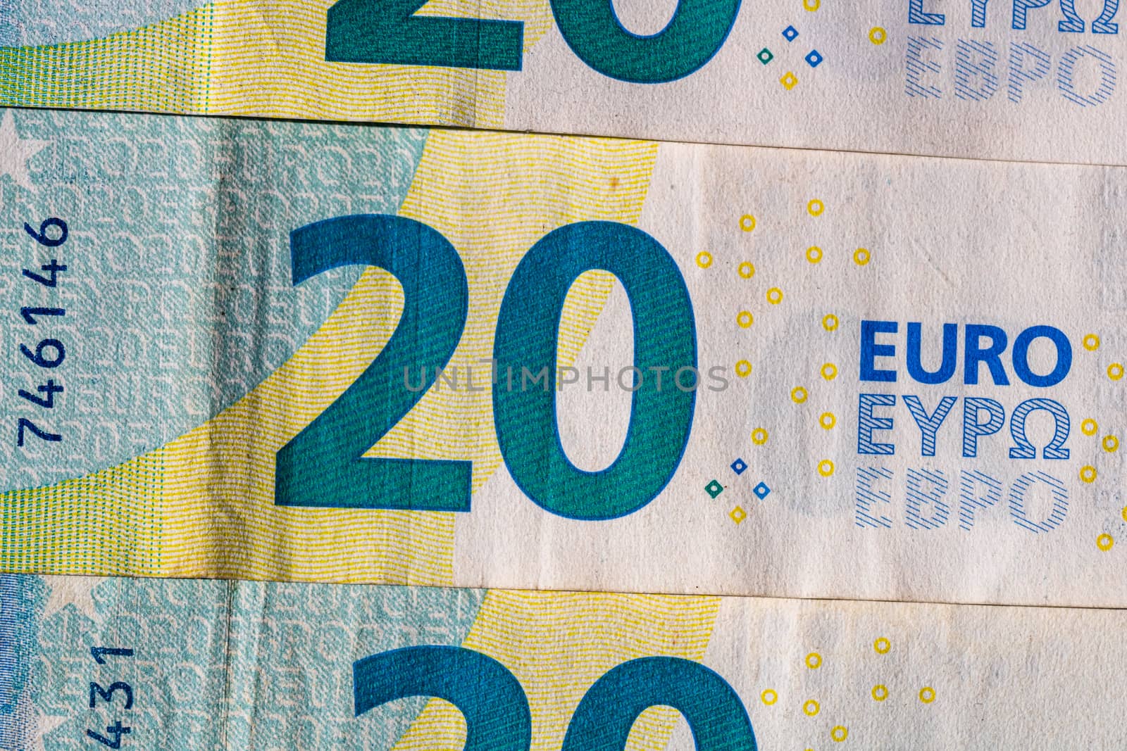 Selective focus on detail of euro banknotes. Close up macro deta by vladispas