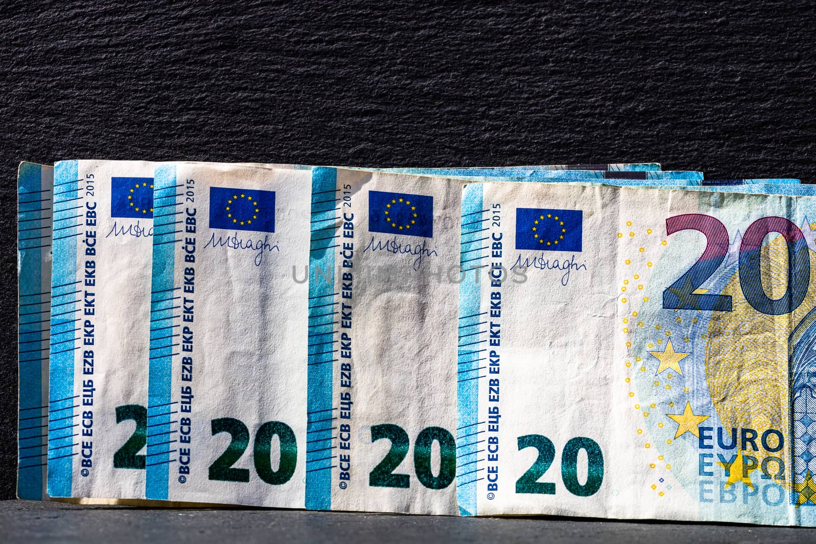 Selective focus on detail of euro banknotes. Close up macro deta by vladispas