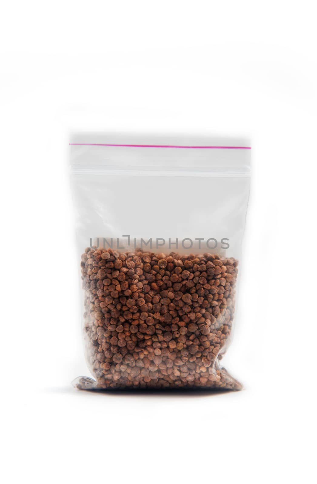 Chinese radish seeds in a package for germination on a white background by galinasharapova