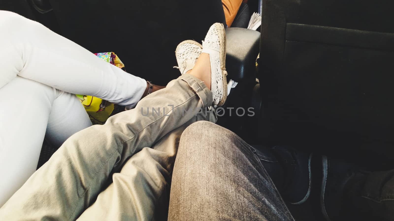 Beautiful young family. Legs of mother, daughter and father