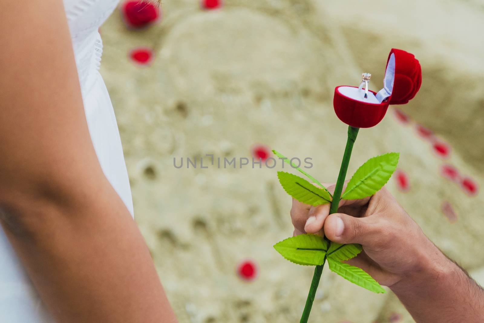 man giving gift box with engagement ring to woman. boyfriend making marriage proposal to girlfriend. Romance, birthday, anniversary, valentine, love, wedding concept