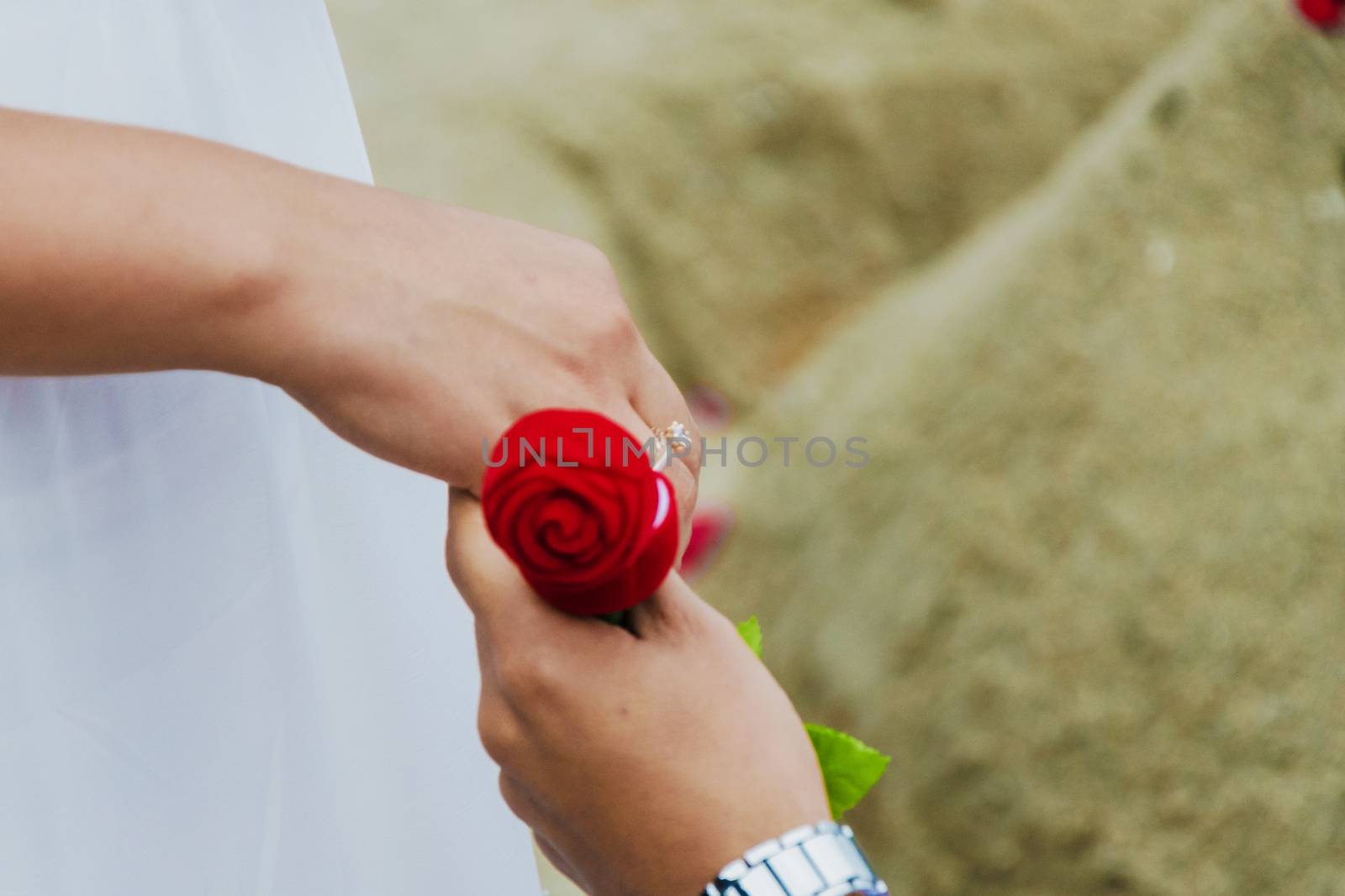 man giving gift box with engagement ring to woman. boyfriend making marriage proposal to girlfriend. Romance, birthday, anniversary, valentine, love, wedding concept
