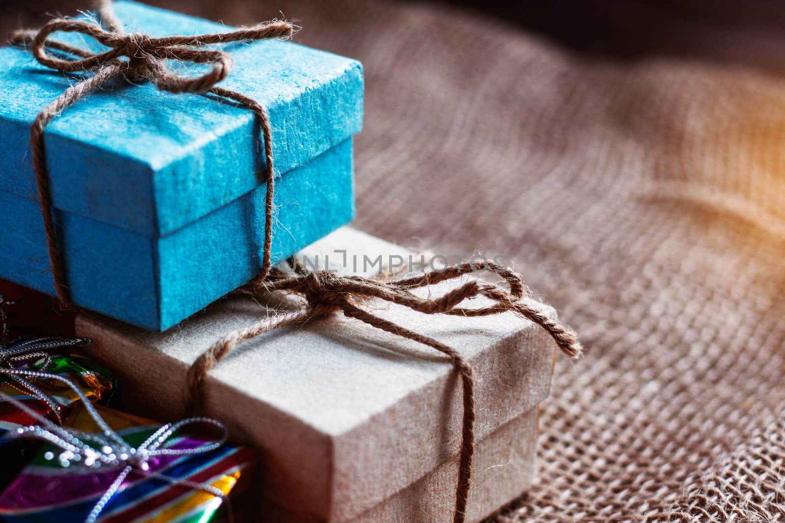 Gift boxes stacked on a table.