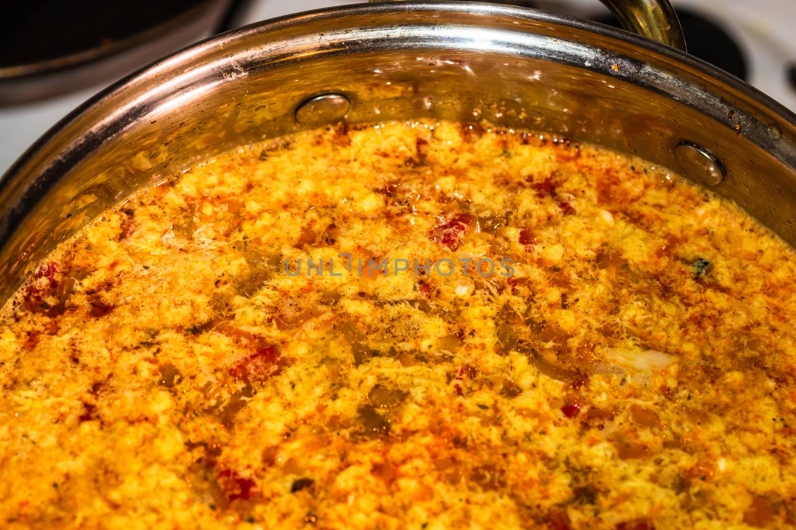 Preparation of soup with chicken and vegetables. Close up of boi by vladispas