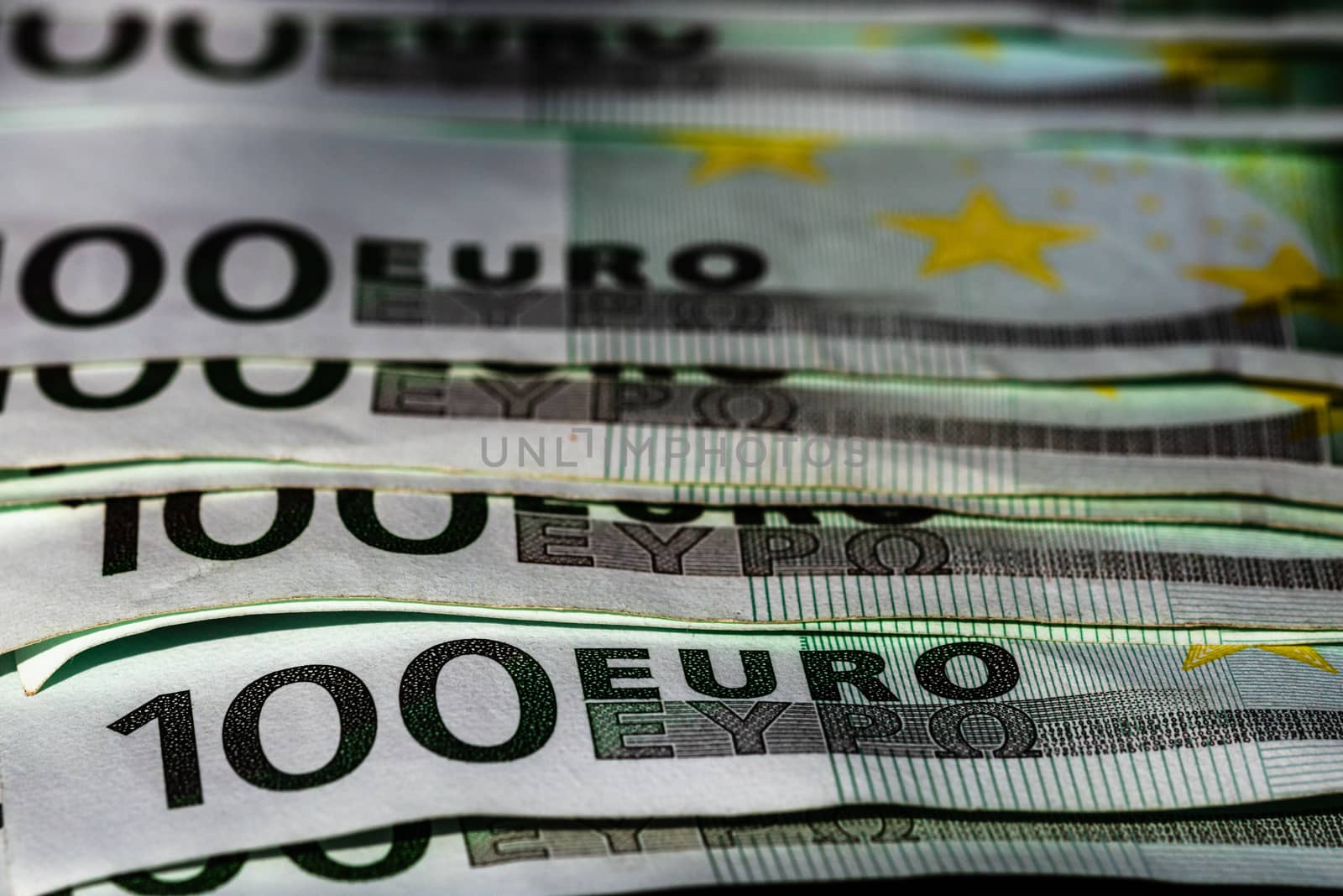 Selective focus on detail of euro banknotes. Close up macro deta by vladispas