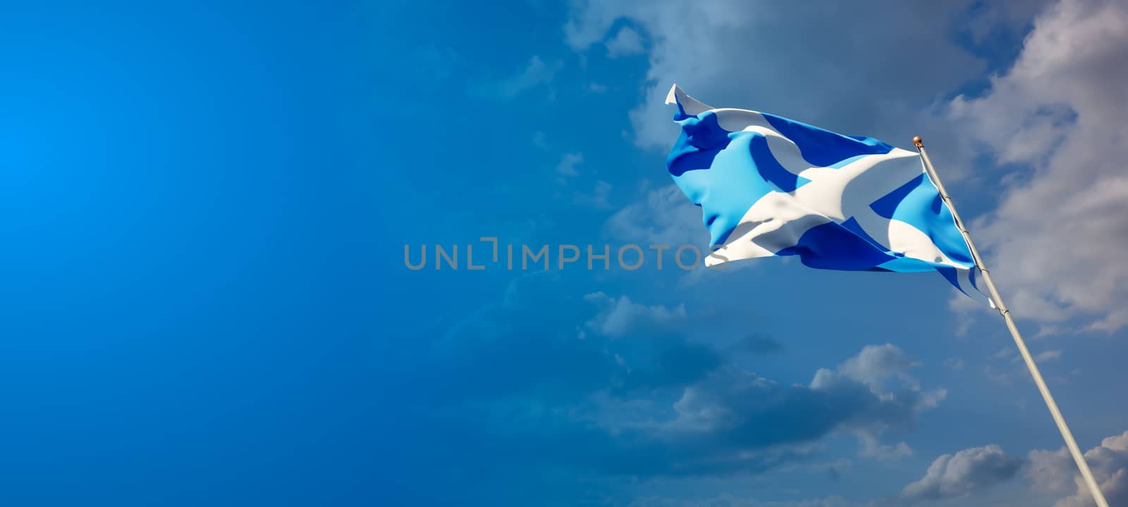Scotland national flag with blank text space on wide background. by altman