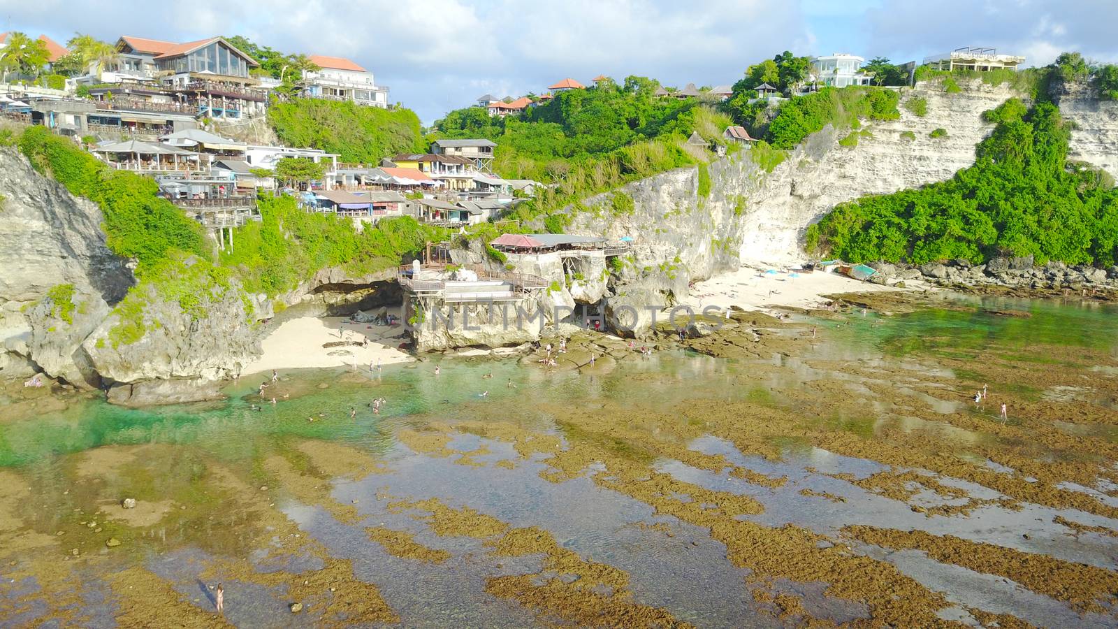 Beautiful beach among the rocks of Bali. by Passcal