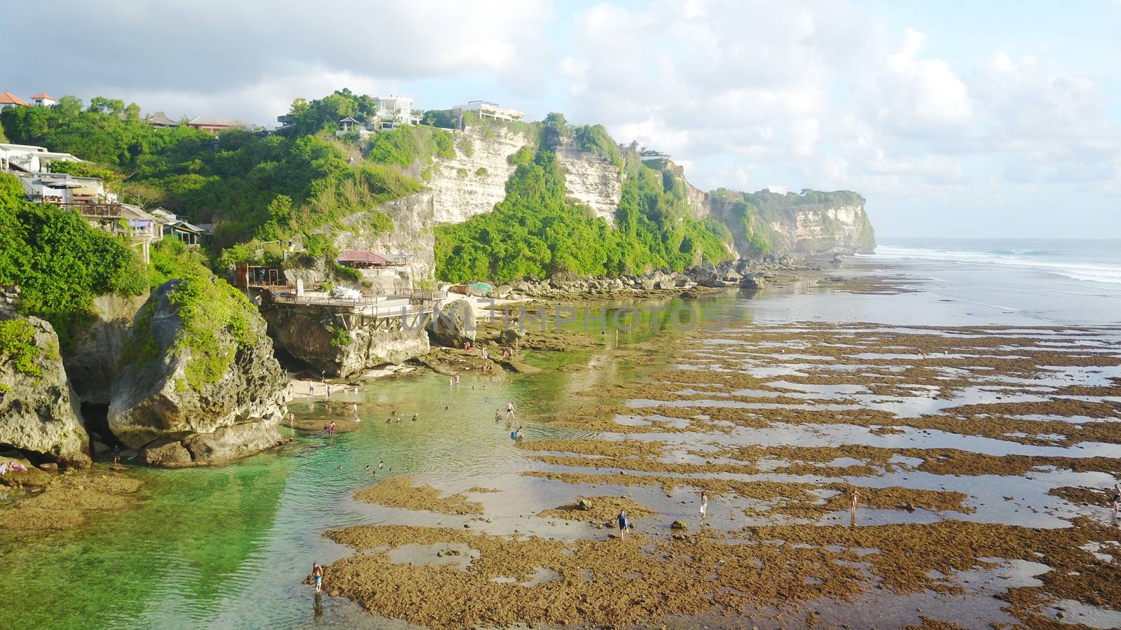 Beautiful beach among the rocks of Bali. by Passcal