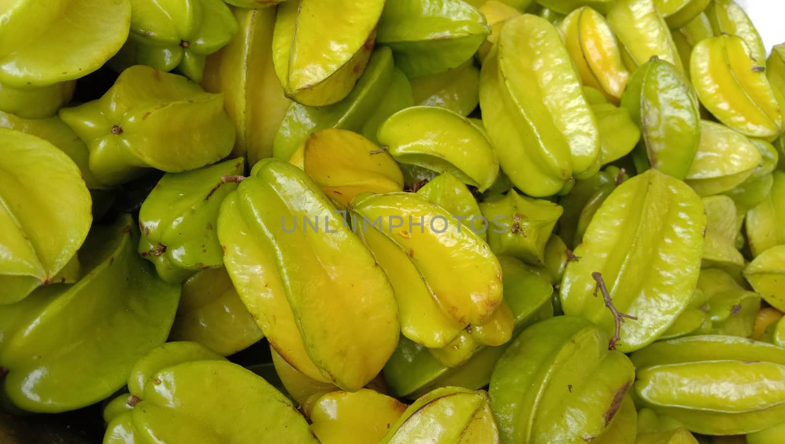 tasty and healthy carambola closeup on shop