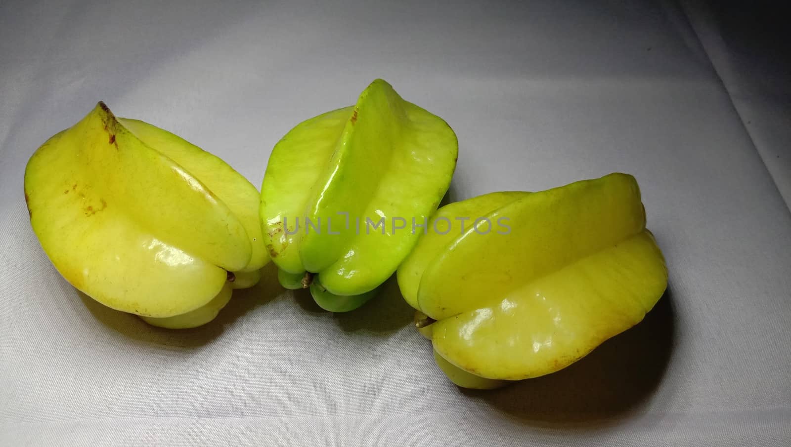 tasty and healthy carambola closeup on shop