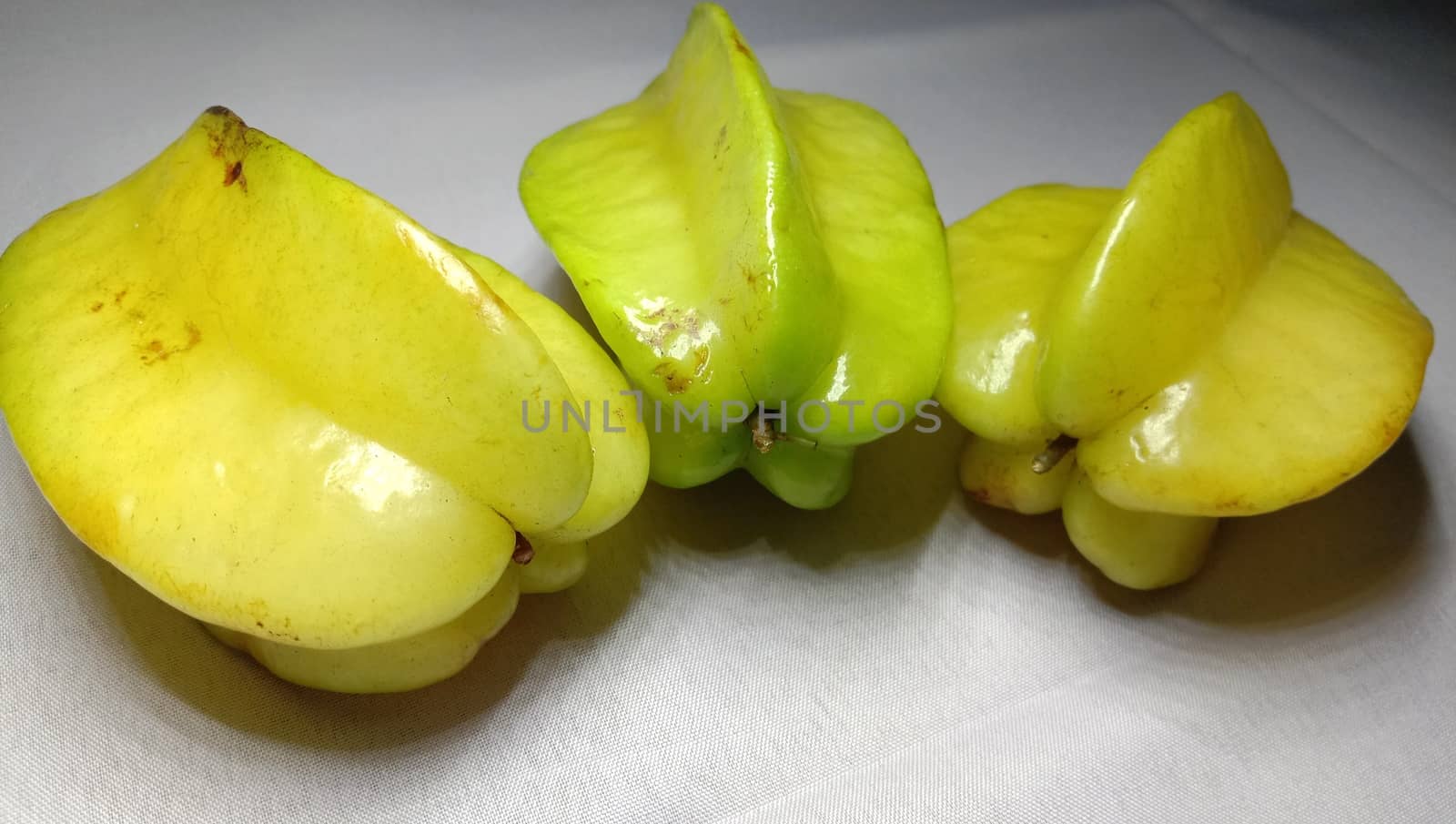 tasty and healthy carambola closeup on shop