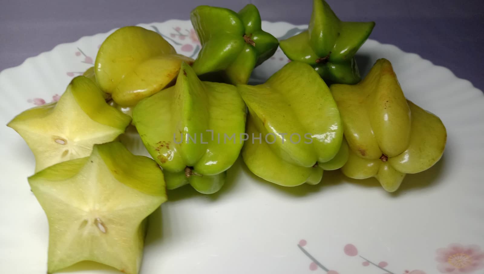 tasty and healthy carambola closeup on shop
