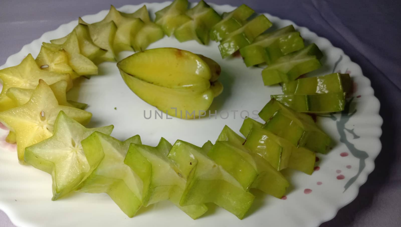 tasty and healthy carambola closeup on shop