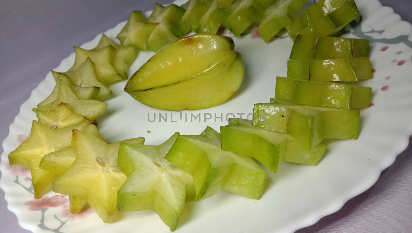 tasty and healthy carambola closeup on shop