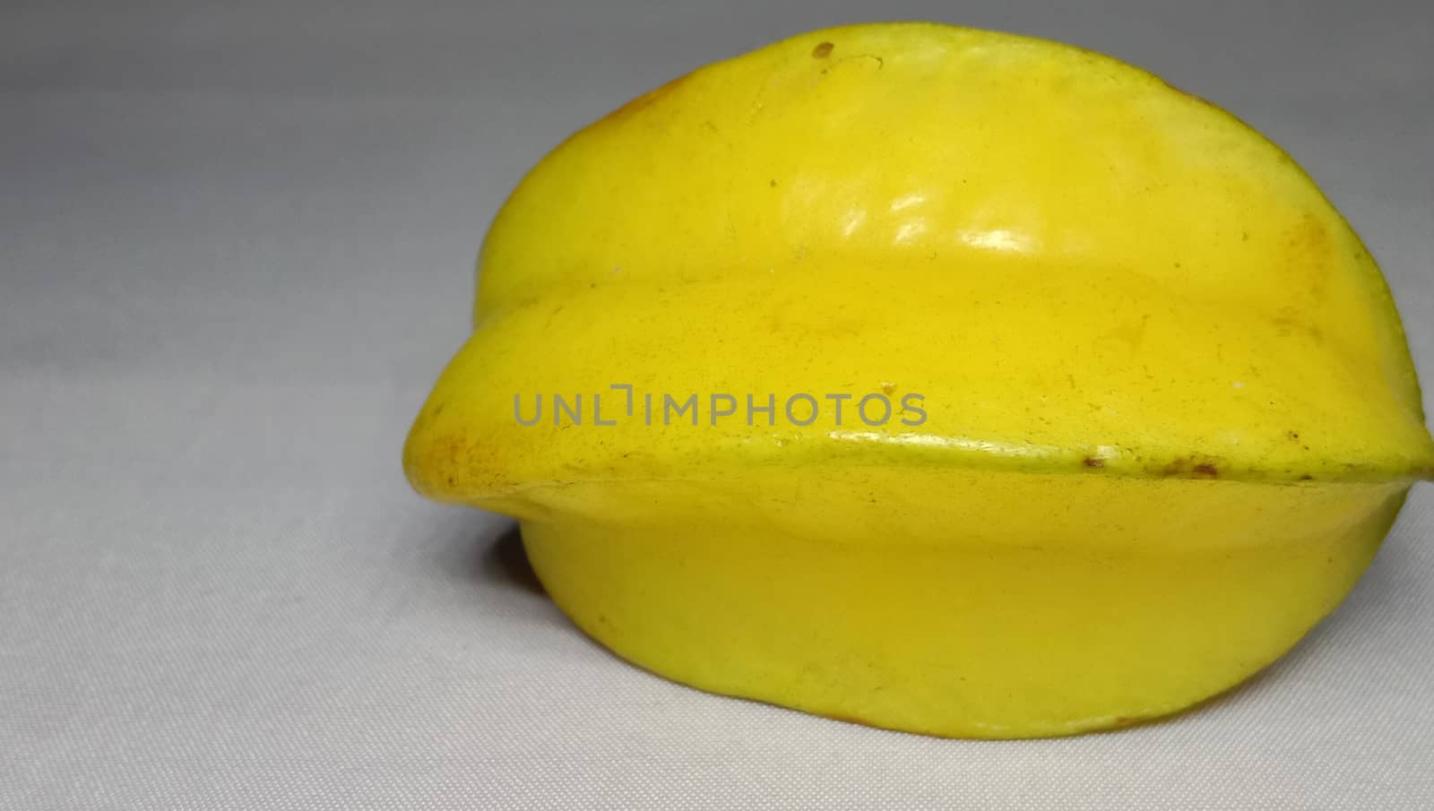 tasty and healthy carambola closeup on shop