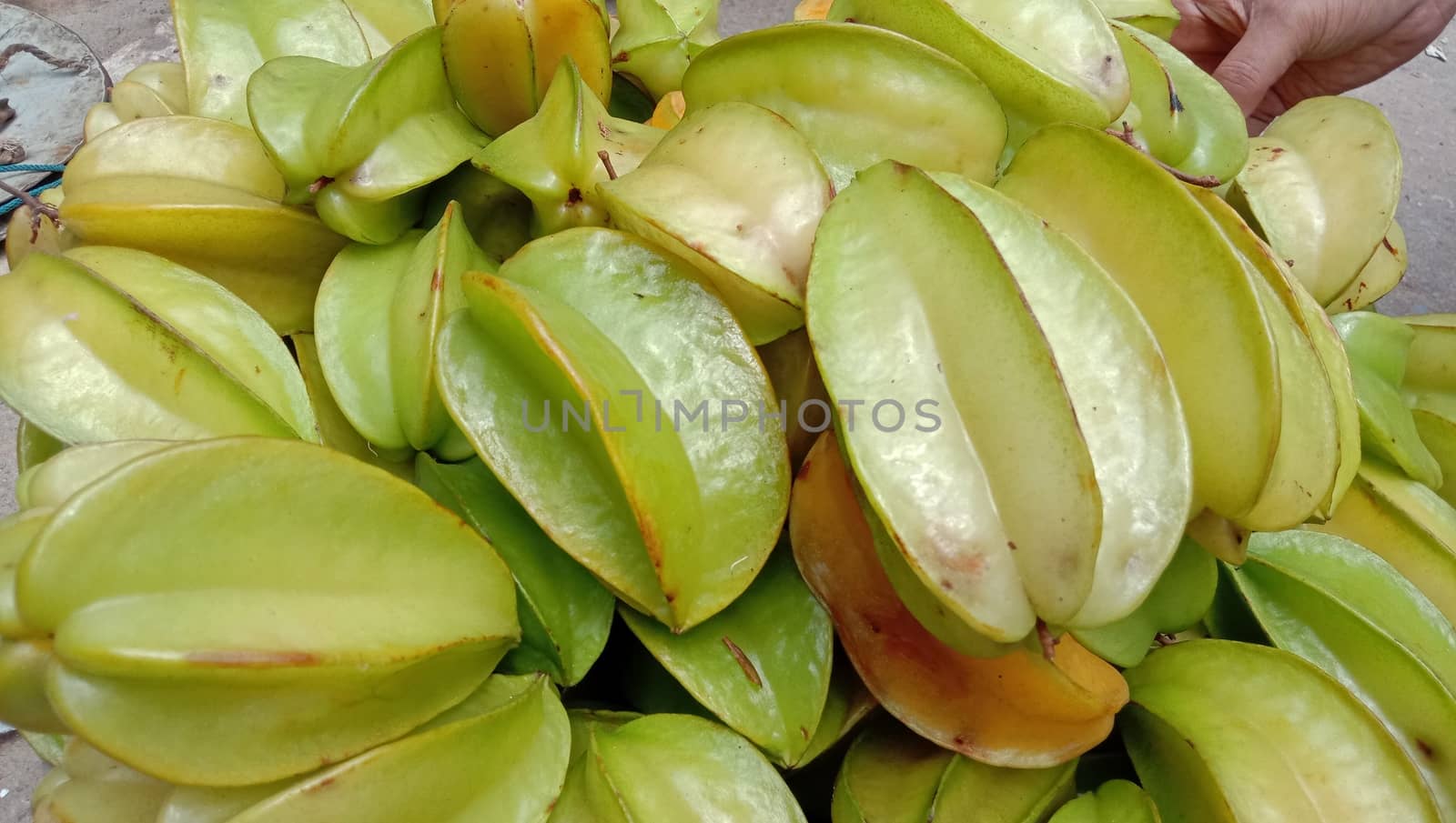 tasty and healthy carambola closeup on shop