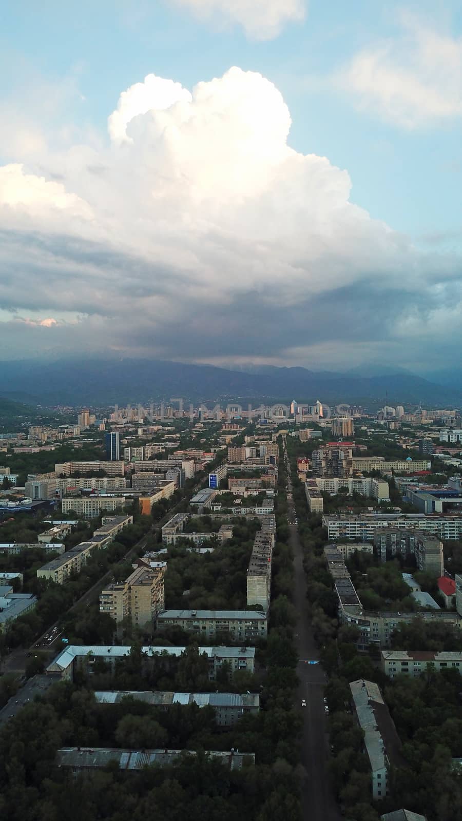 Huge clouds over the city of Almaty. by Passcal