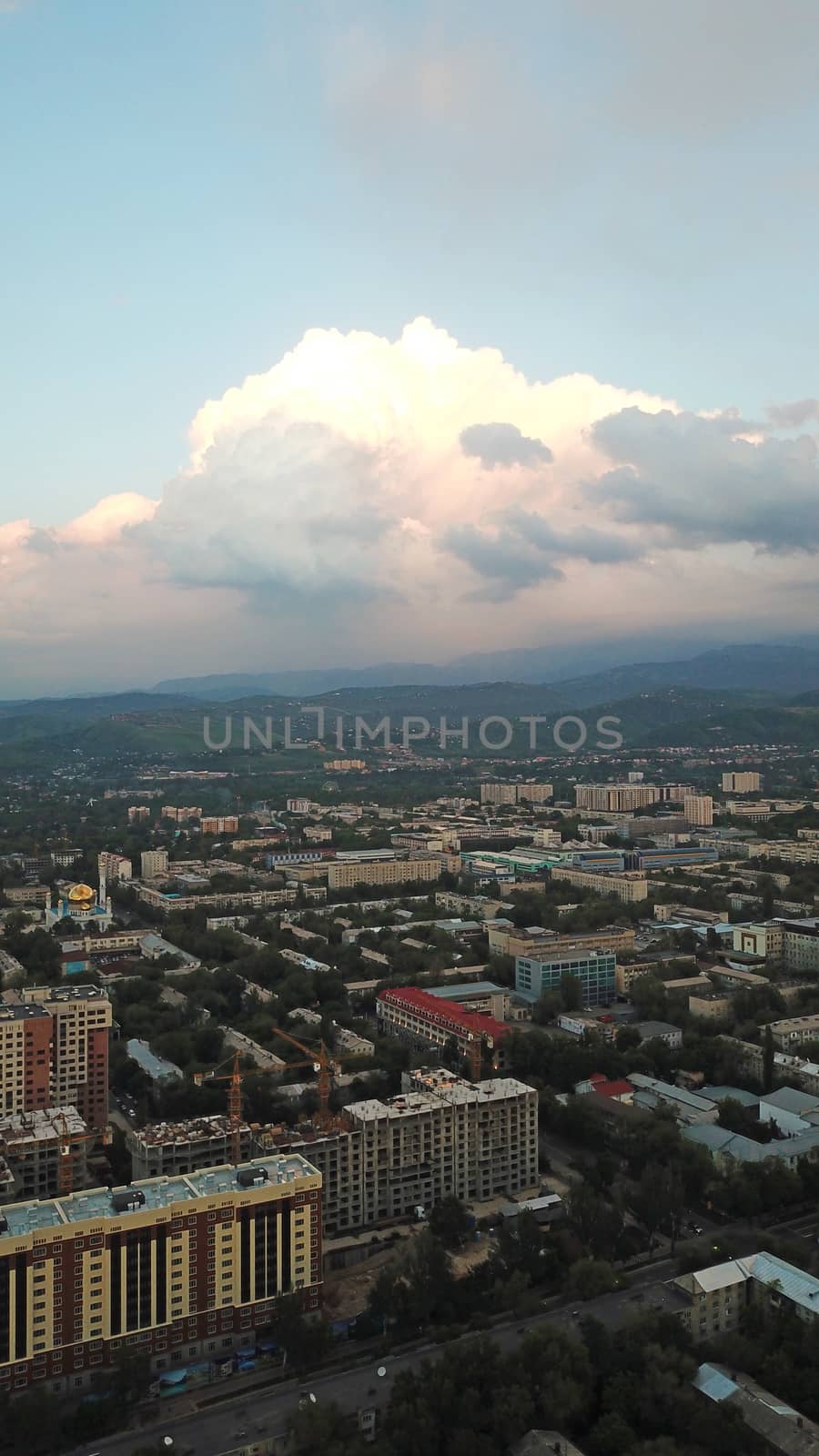 Huge clouds over the city of Almaty. by Passcal