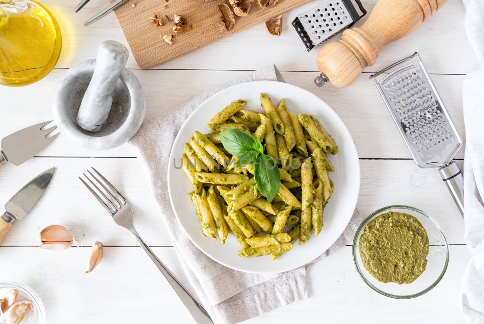 Step by step cooking italian pesto sauce. Step 9 - adding pesto to pasta