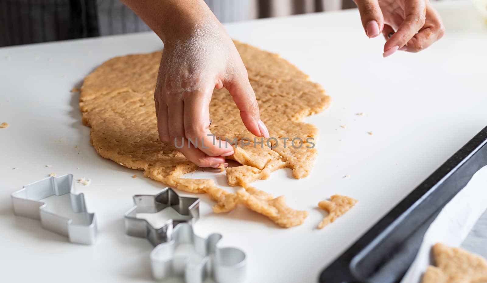 woman hands baking cookies at the kitchen by Desperada