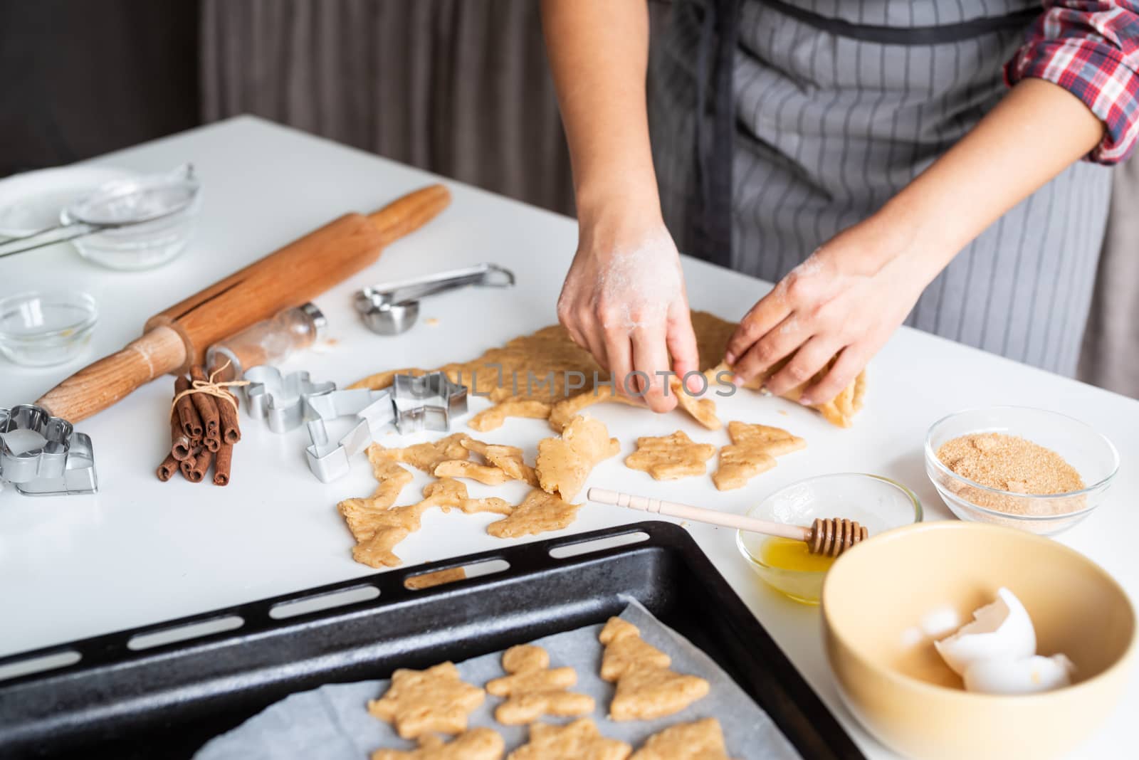 Cooking and baking. woman hands baking cookies at the kitchen