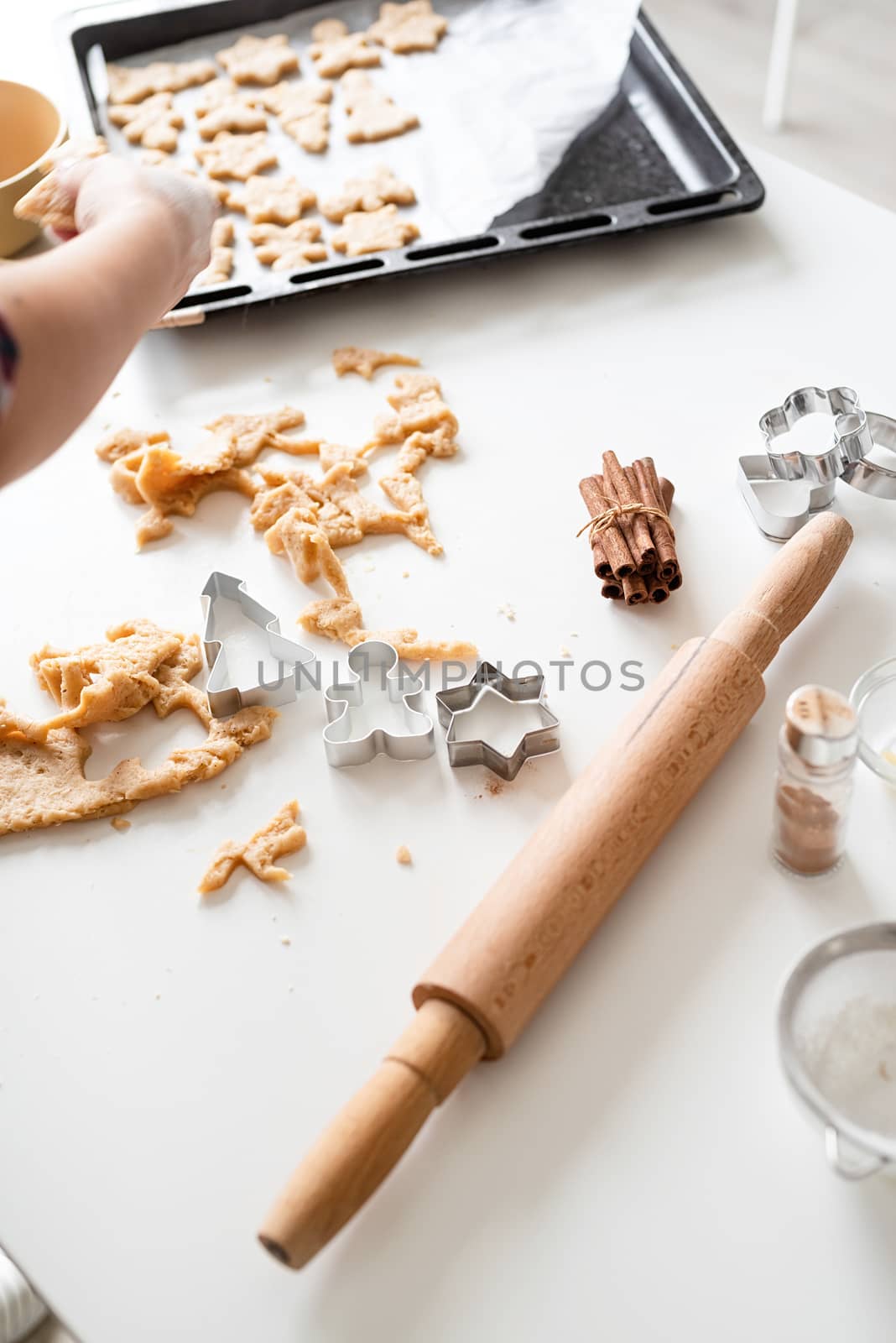 woman hands baking cookies at the kitchen by Desperada