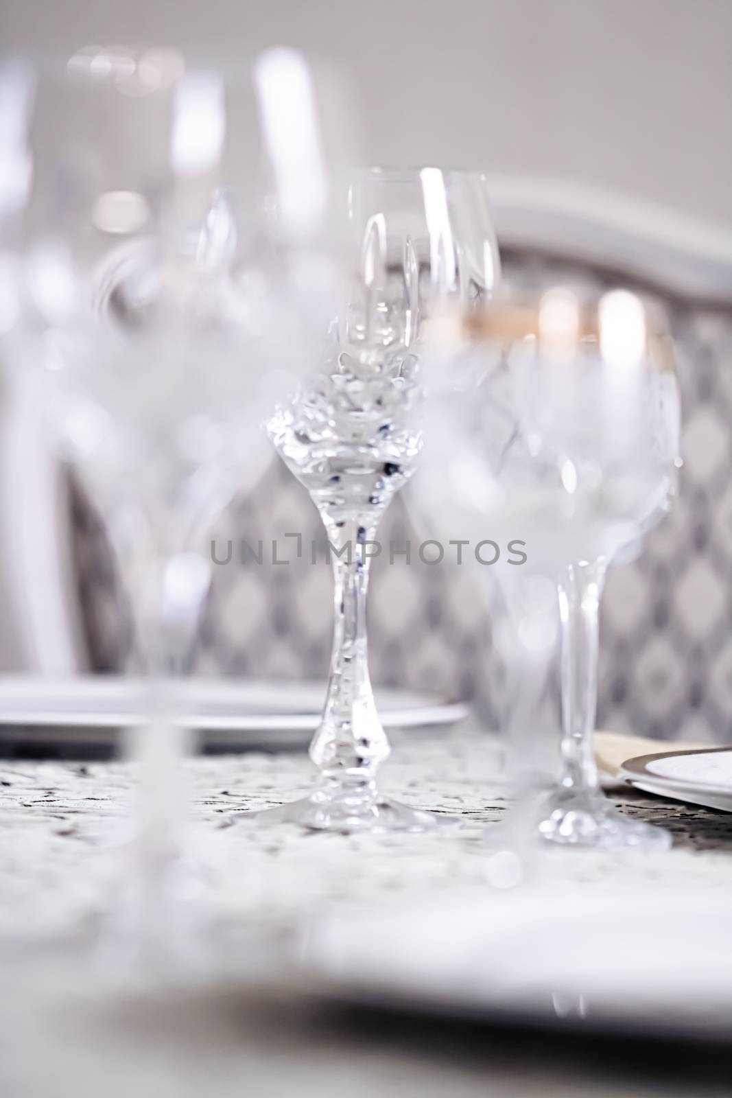Crystal glasses as luxury table glassware and bohemian glass design, home decor and event decorations