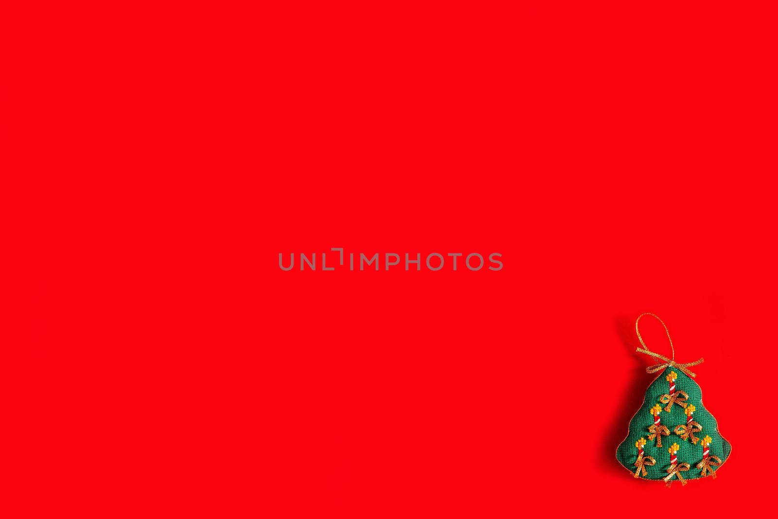 Christmas background with embroidered Christmas toys on red background, holiday, new year and Christmas concept