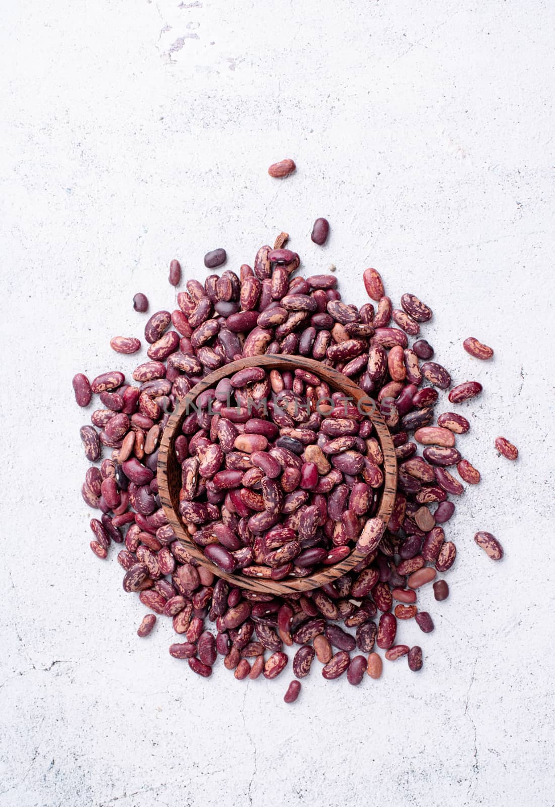 Kidney beans top view on gray background by Desperada