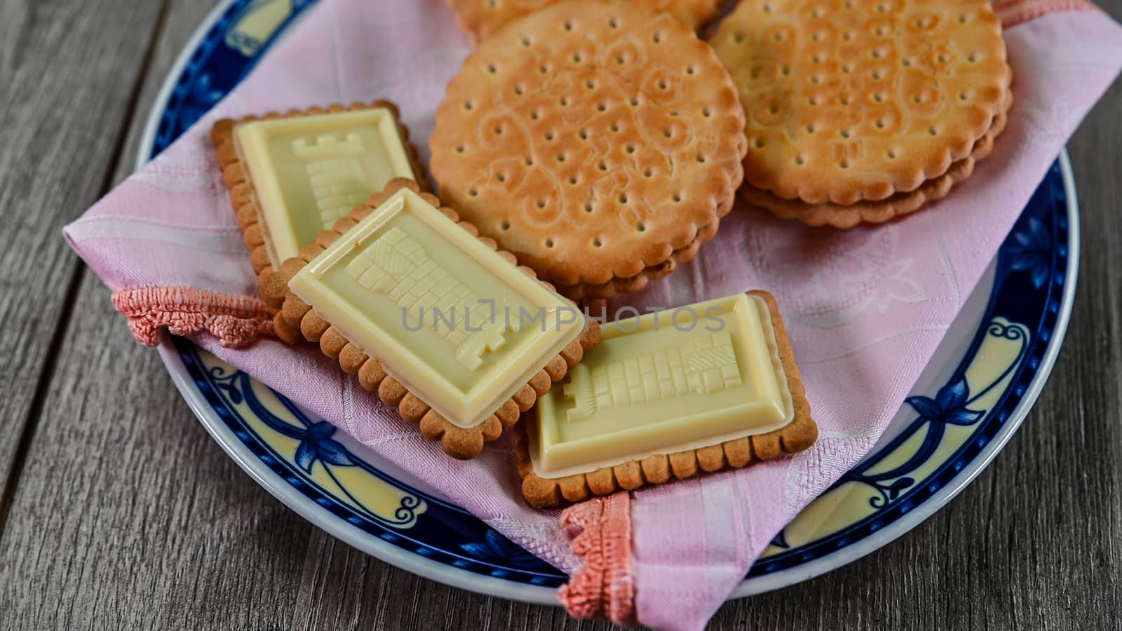 food combination with biscuits on a wooden table from above