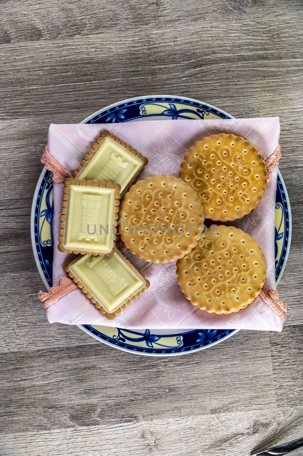 food combination with biscuits on a wooden table from above