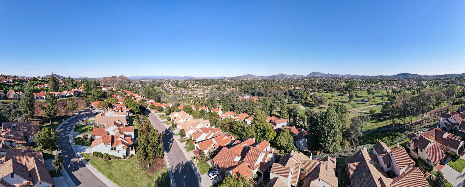 Aerial view of middle class neighborhood with residential house community in Rancho Bernardo during autumn season, South California, USA.