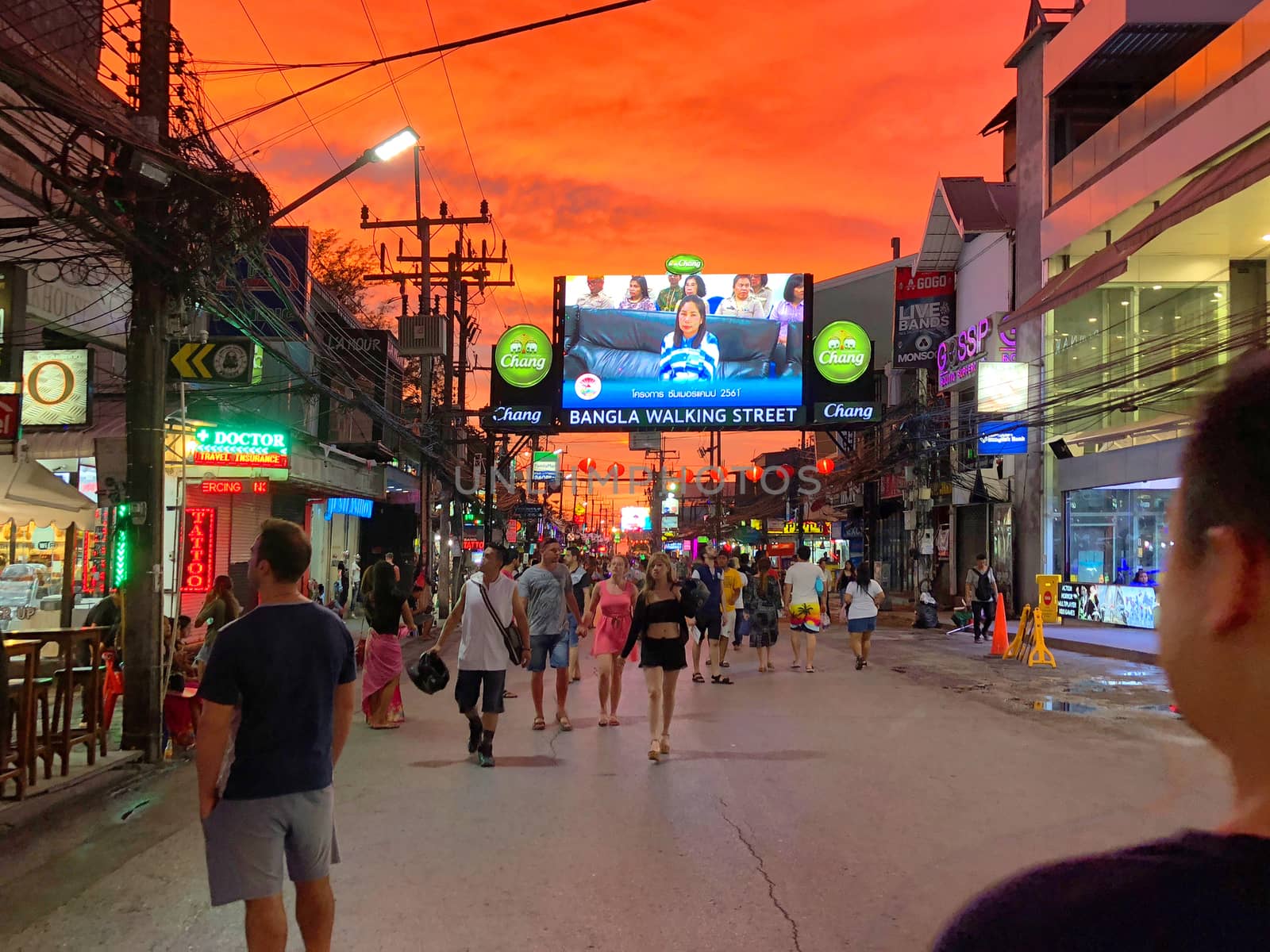 PHUKET, THAILAND JUNE, 2018: Tourists walking to see sunset view at street night market of Phuket, Thailand on June 16, 2018.