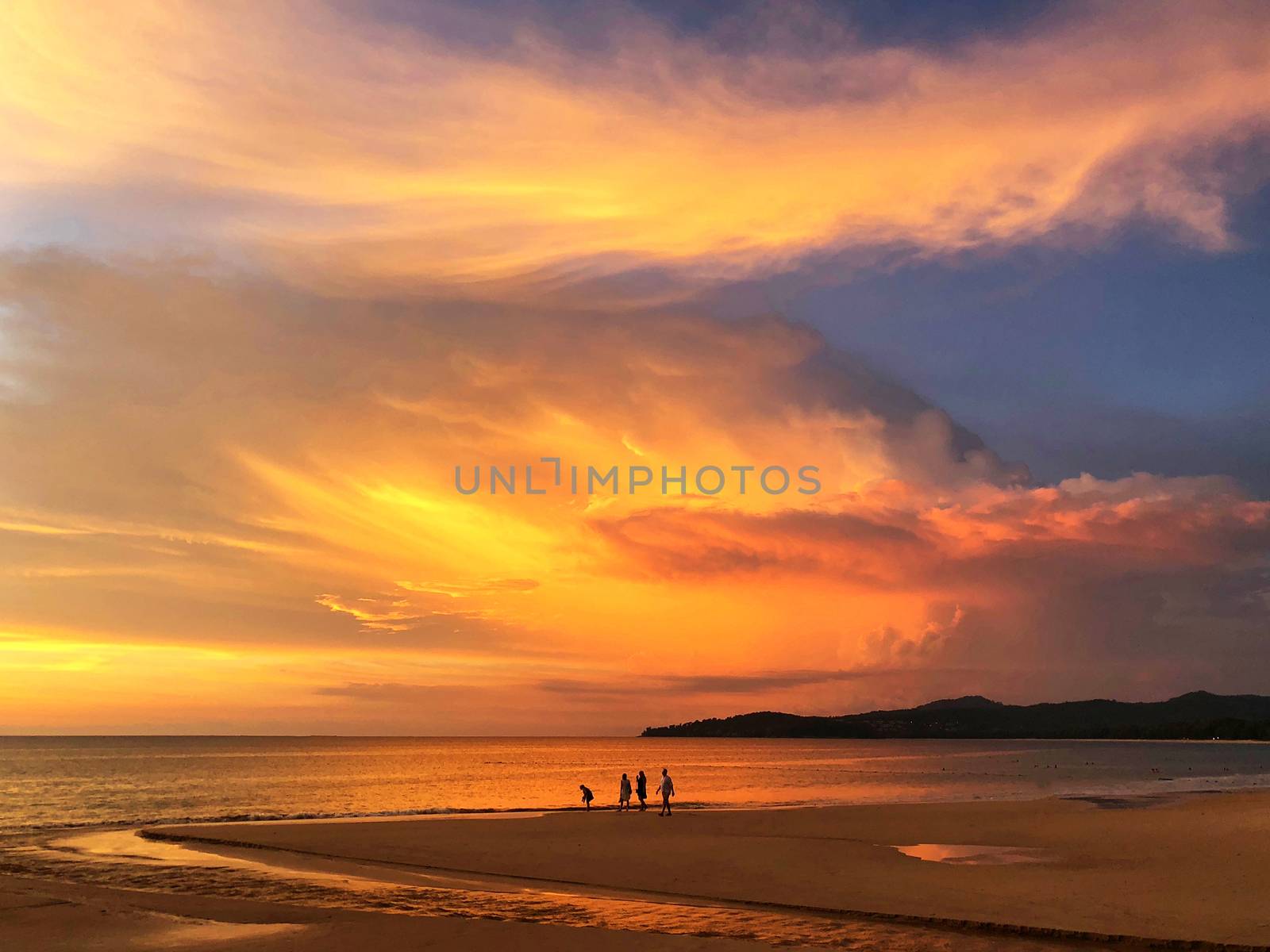 Panoramic view of sunset at Karon beach in Phuket, Thailand by Surasak
