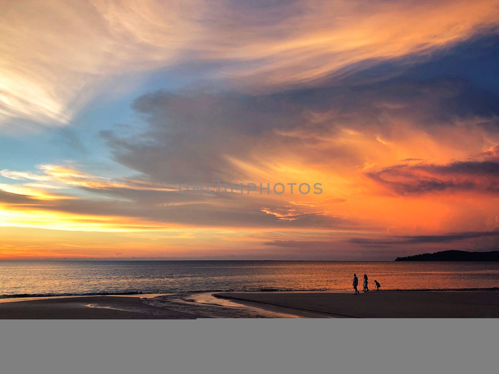 Panoramic view of sunset at Karon beach in Phuket, Thailand by Surasak