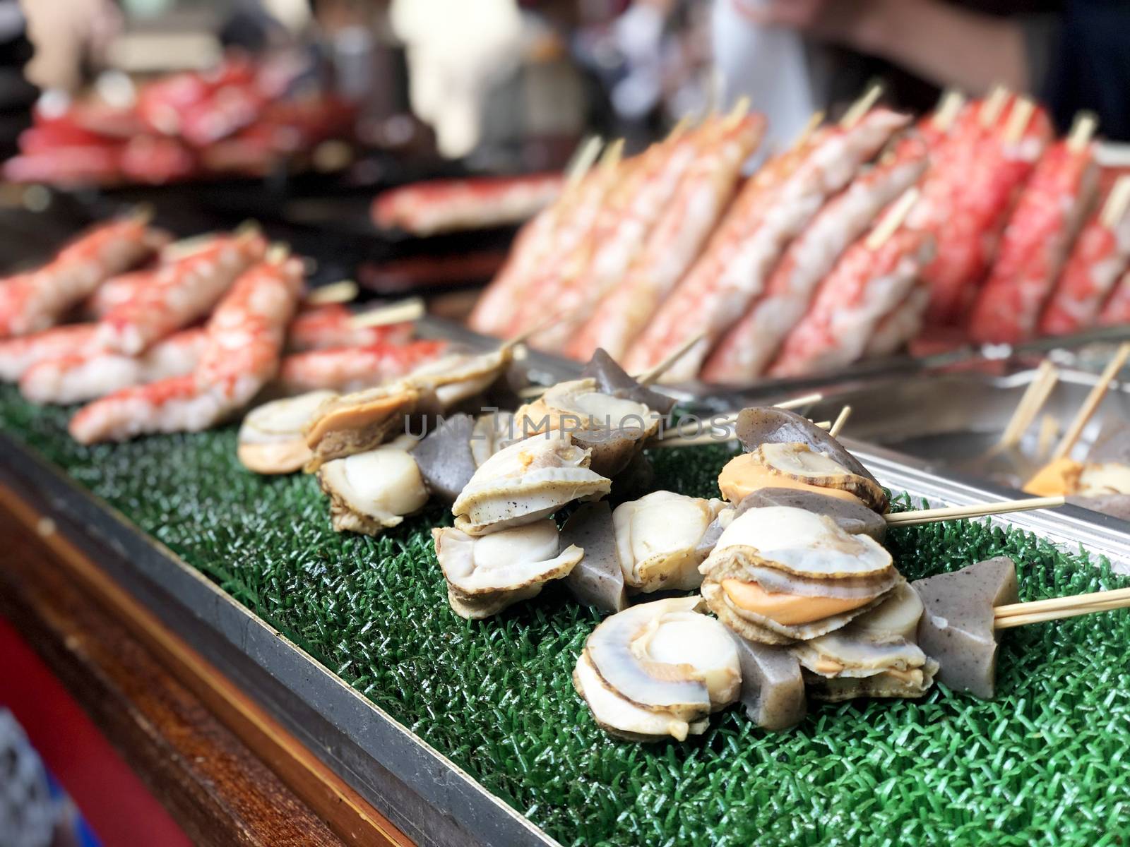 Seafood Street food in Tsukiji Fish Market, Japan. by Surasak