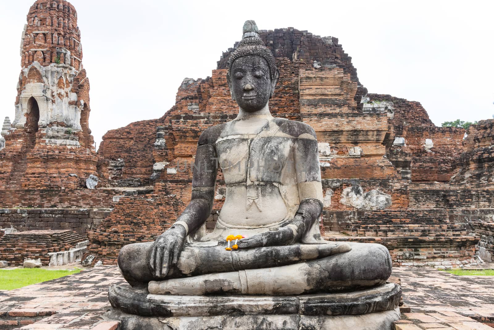 Sitting Buddha image on cement, Built in modern history in Ayutthaya, Thailand 