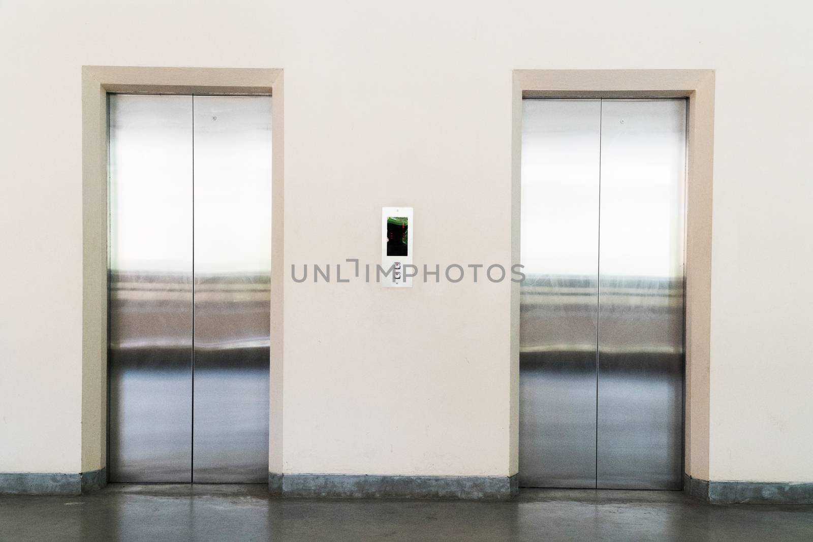 two elevator door inside the building
