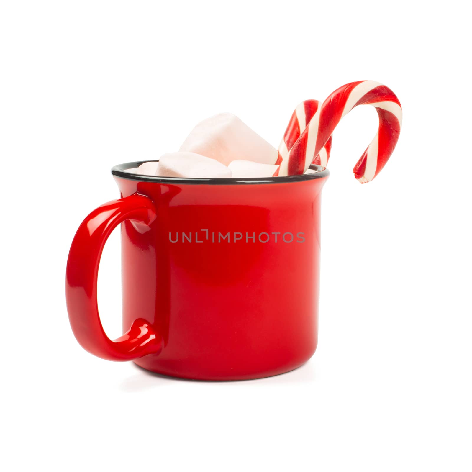 Cocoa in red mug with marshmallows and candy cane isolated on white background