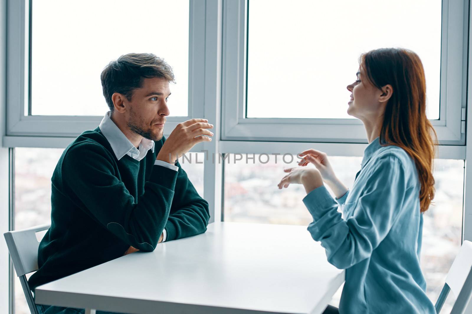 Young couple in a cafe at the table dating communication relationship