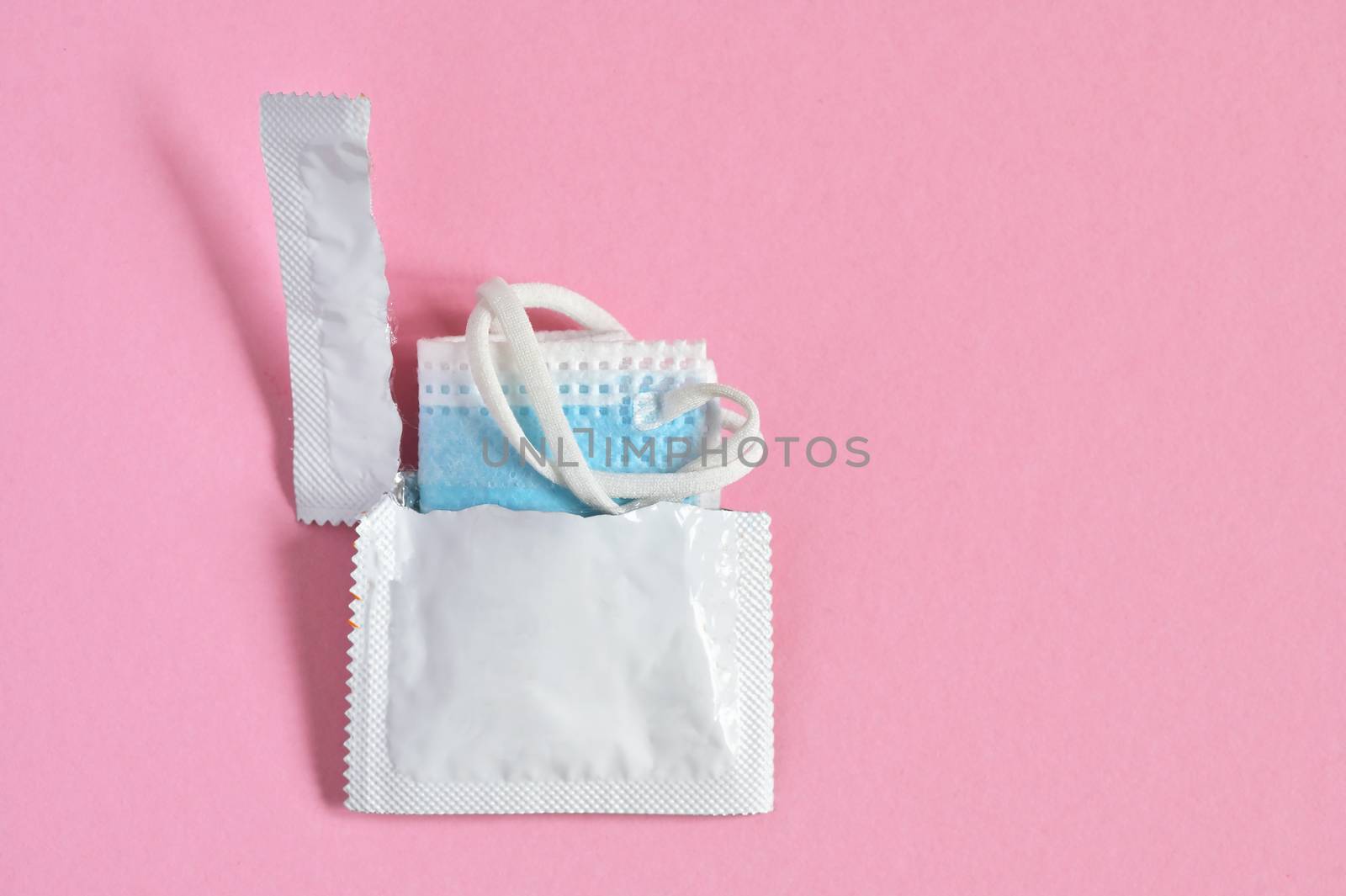 Abstract of Medical Masks and Condom Package Isolated 